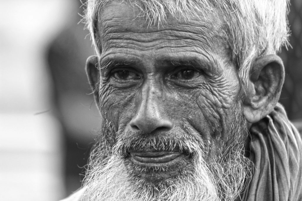 Dignified, hopeful portrait of elders — warm and respectful